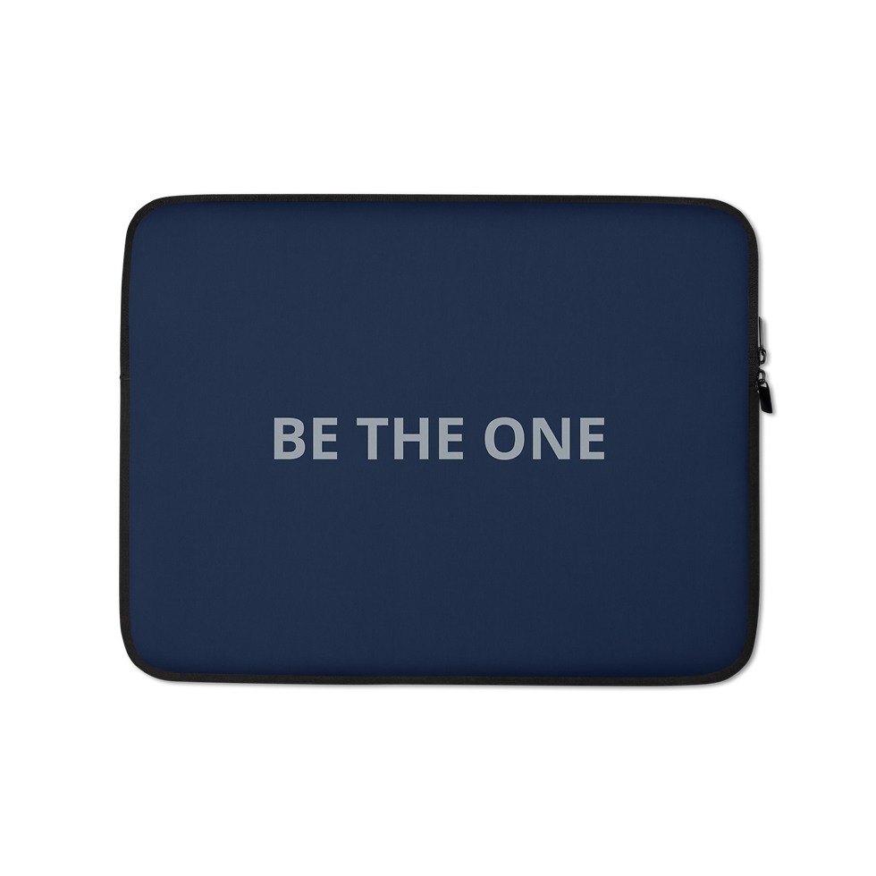 Navy laptop sleeve featuring the statement BE THE ONE.