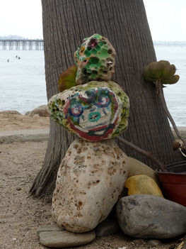 Rock sculpture on beach painted as confusingly as the Bipolar II and ADHD mind