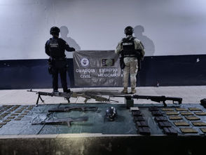 Aseguran en Aguililla Michoacan arsenal con barret, ametralladoras y granadas, tras repeler un ataque.