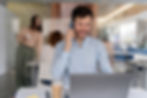 young-business-man-working-her-desk-with-laptop.jpg