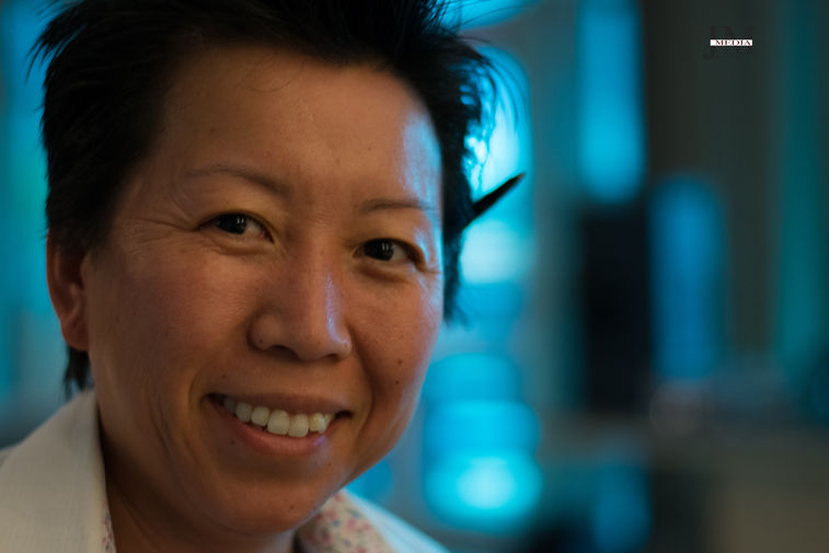 Smiling woman with short dark hair