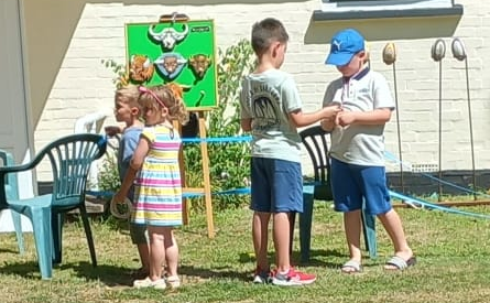 4 children playing the garden games