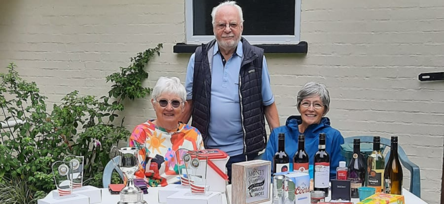 Hedley, Lesley and Ally with the trophies and raffle prizes