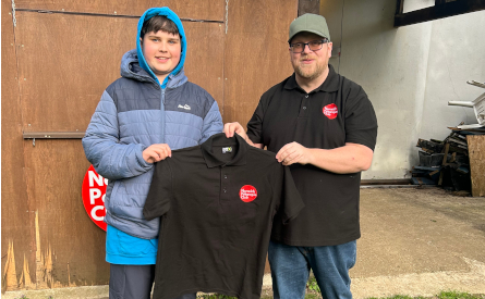 William being presented his Shirt by Coach Mark Bell
