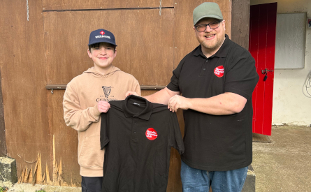 Cody being presented his Shirt by Coach Mark Bell