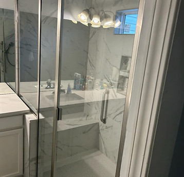 marble-bathroom-remodel-linville-nc-glass-shower-door-finish-ls-stucco-stone-tile.jpg