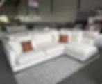 The Mia Chaise Lounge with soft feather wrap seats in Warwick white fabric
