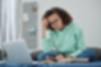 young african american woman using laptop