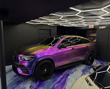 Complete vehicle customization including wrap, caliper painting, and interior upgrades