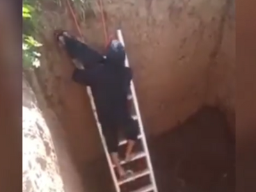 RESCATAN A CACHORRO ATRAPADO EN UNA FOSA