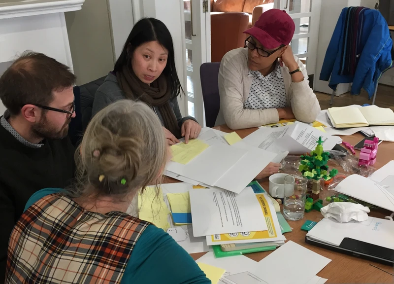 360 leadership report text over an orange background 