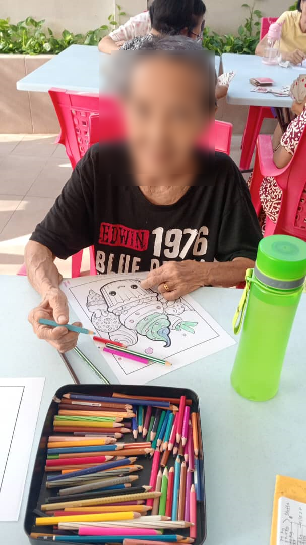 Female Patient colouring in Care Home
