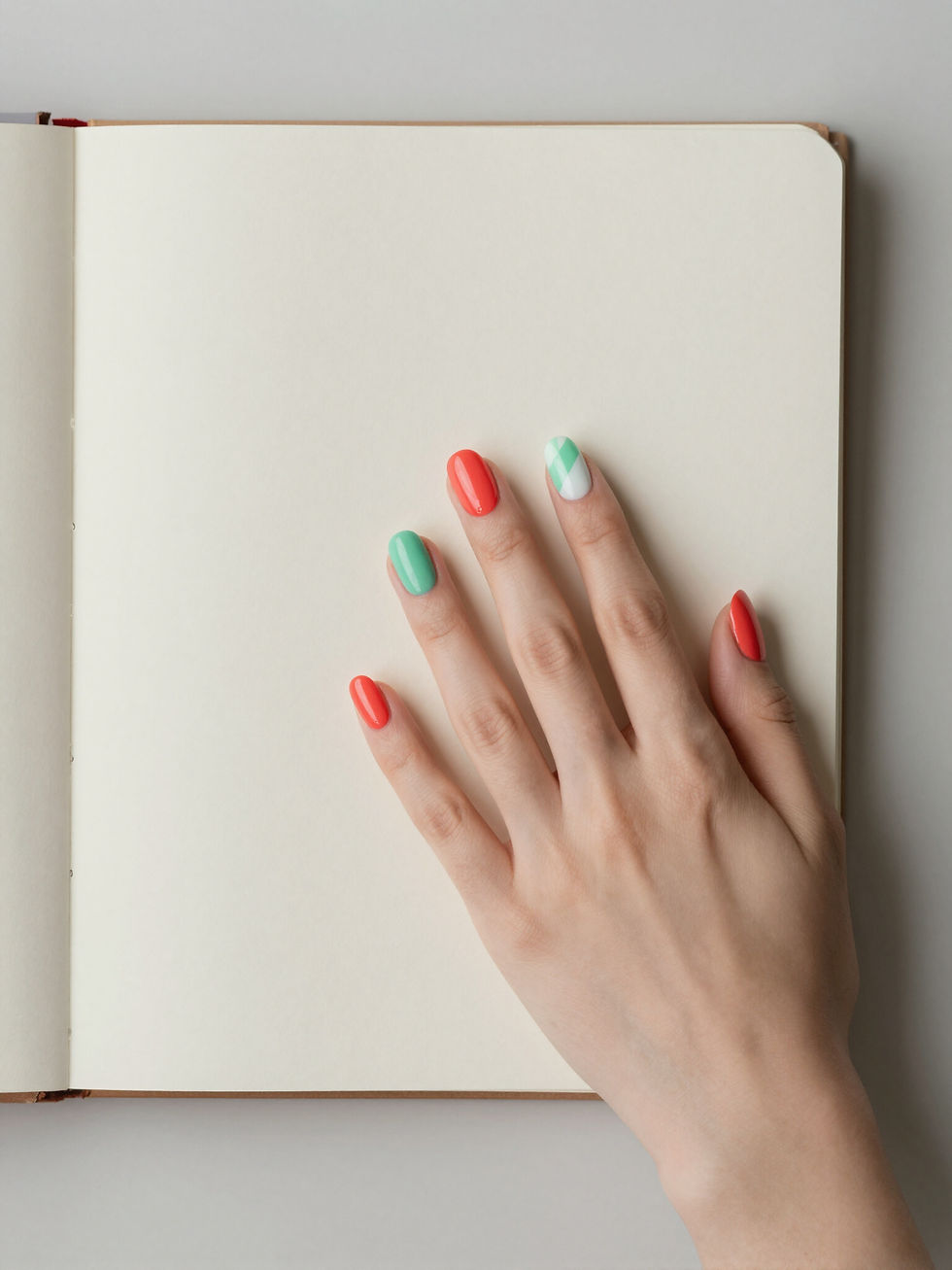 Hand on Notebook