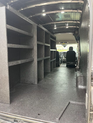 Flake epoxy walls and floor, along with custom shelving inside a work van 
