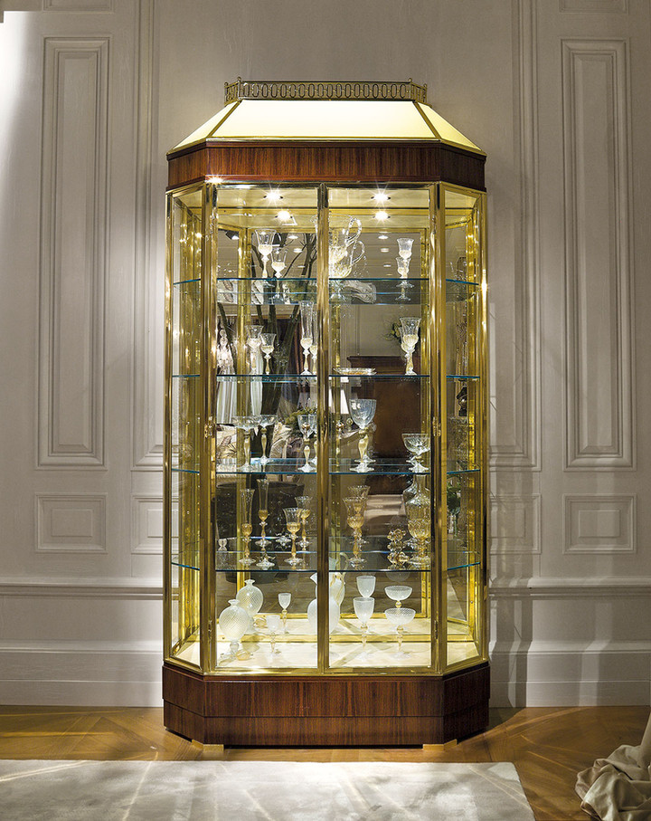 Crystal and brass showcase cabinet with glass shelves. Internal LED lighting.