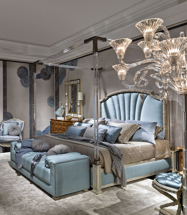 Hand carved headboard and bed frame in silver leaf finish and upholstered in luxury fabric. Canopy in methacrylate with brass details.