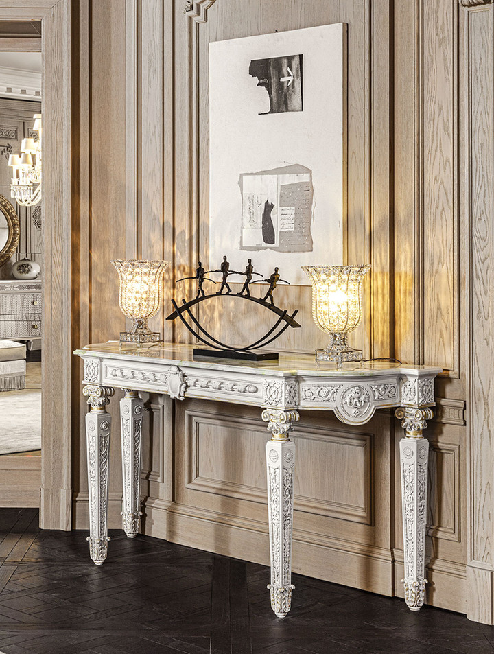 Hand carved console white and gold leaf finishing with marble top.