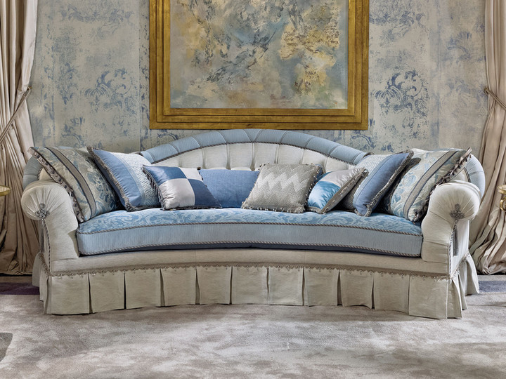 Upholstered sofa with luxury fabrics.