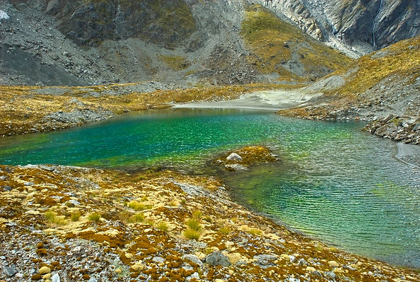 A brilliant snow melt lake in the headwaters of the Dart river, a magical place in the South Island of New Zealand.