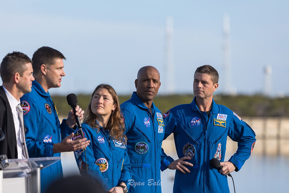 Artemis II Crew during a rollout press conference // Photo: Ryan Bale