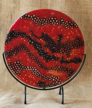 12" round black and red murrini glass piece and stand by Sandra Graham, Glass Owl Studio