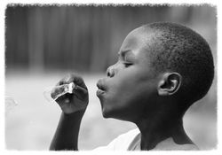 African Boy Blowing Bubbles 2014-7-16-14:43:48