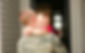 Man hugging a small child