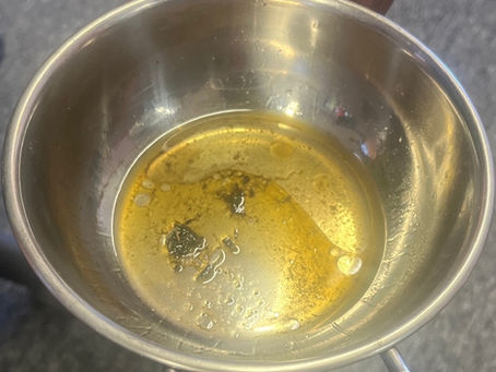 Bowl with fuel and water in it.