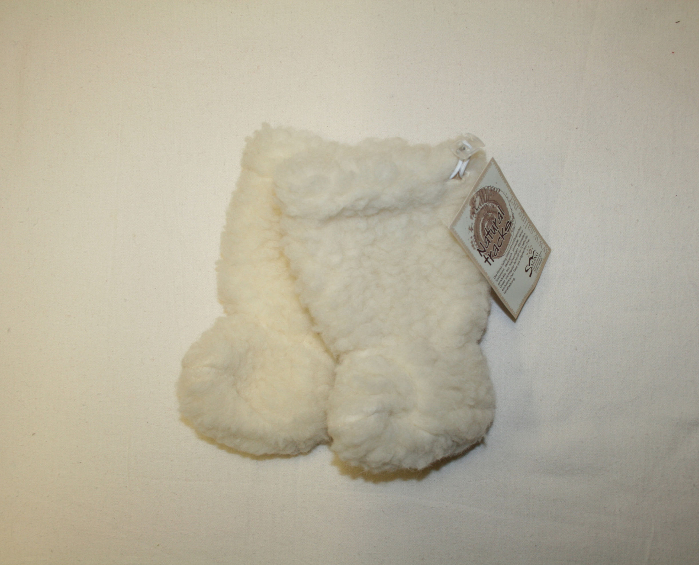 Babyschuhe aus Wollplüsch, natur