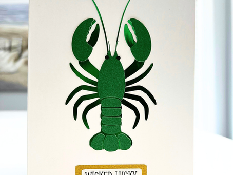 Handcrafted St. Patrick’s Day green lobster greeting card with layered emerald paper and “Wicked Lucky” plaque by Mainely Cards