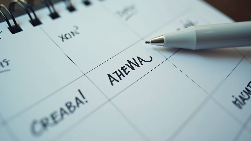Close-up view of a calendar with scheduled appointments marked