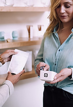 woman holding white pack_edited.jpg