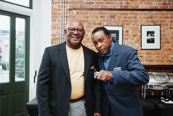 Two men standing together