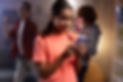 medium-shot-woman-holding-smartphone.jpg