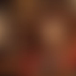 Dolly Raynor posing in her living room