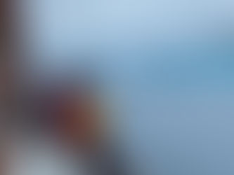 On a sailboat looking at Greenland