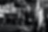 Enzo Ferrari stands in front of engine in factory