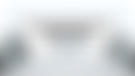 Conference room with empty grey chairs, text: "Not every interested buyer deserves a seat at your table." Hartmann Rhodes logo below.