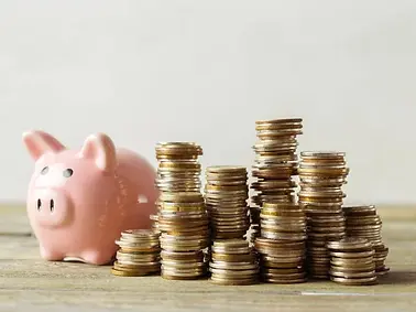 depositphotos_218547928-stock-photo-piggy-bank-coins-stacks-old.jpg