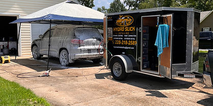 Hydro Slick Detailing mobile detailing setup at a customer’s vehicle