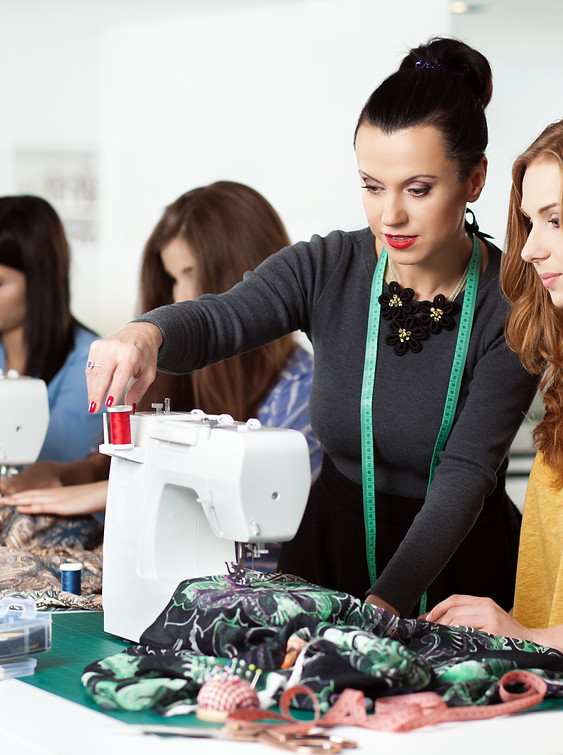 bigstock-Group-of-women-in-a-sewing-wor-109980686.jpg