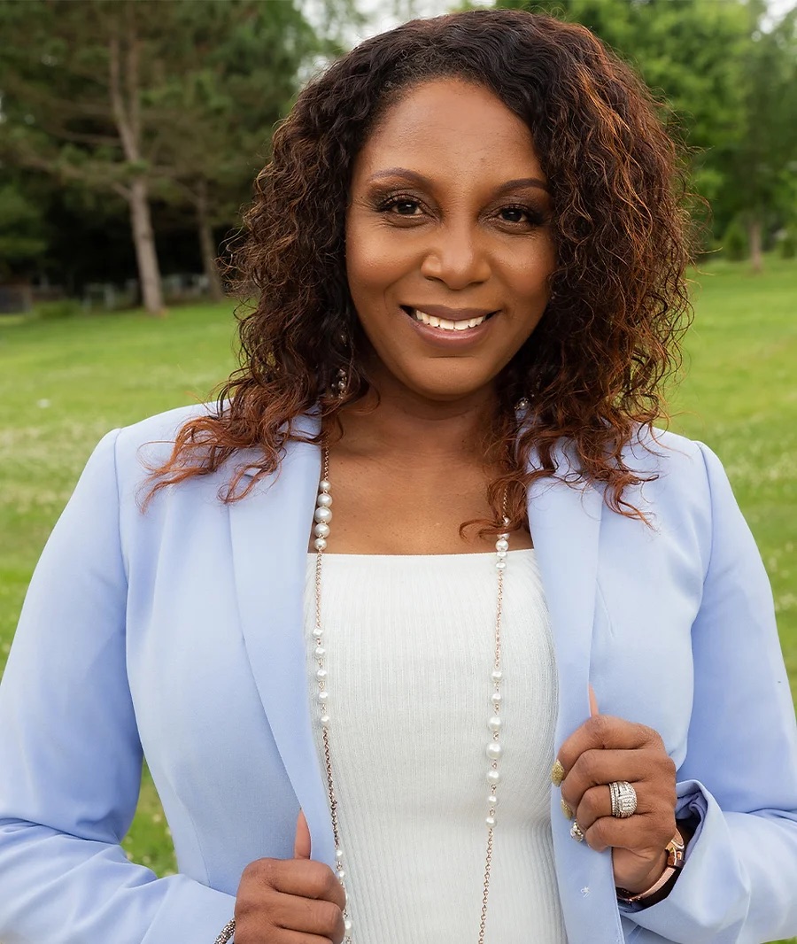 _0008_larita purple both hands on jacket-1.webp