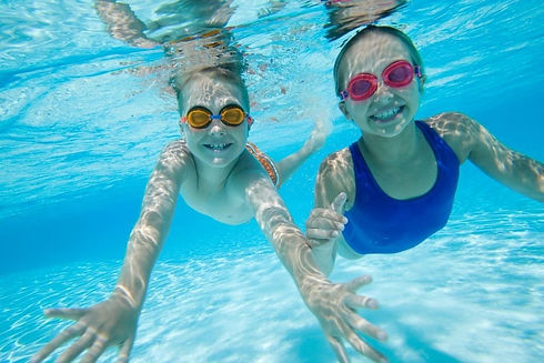 Boy and girl underwater.jpeg