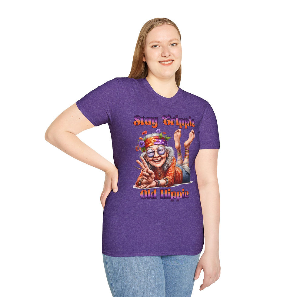 Thumbnail: Woman wearing purple shirt with text and graphic, posing with a smile.