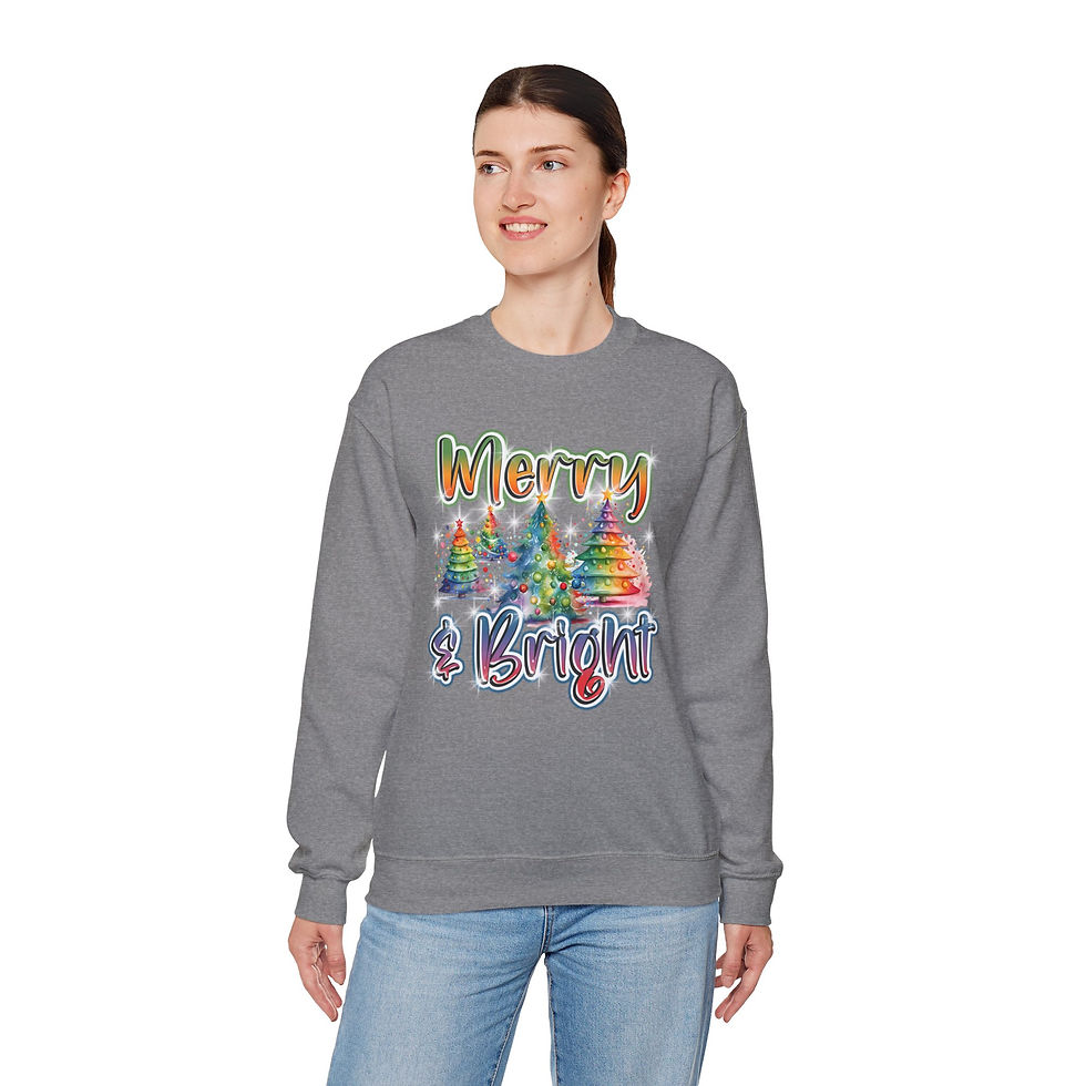 Thumbnail: Woman wearing Merry and Bright Sweatshirt with Gradients and Colorful Trees Crewneck, smiling, grey background.