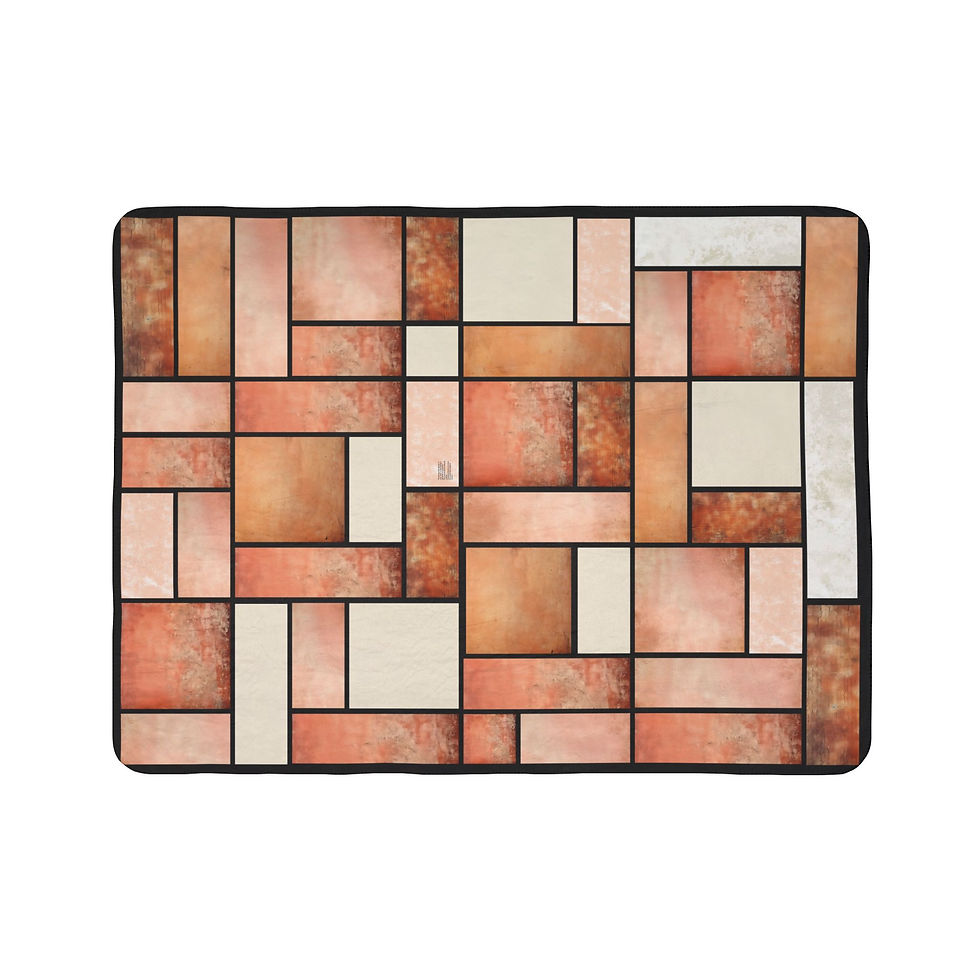 Abstract pattern blanket in shades of tan and white, geometric design.