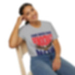 Smiling woman wearing gray crop top with Take Back Our Democracy Now text.
