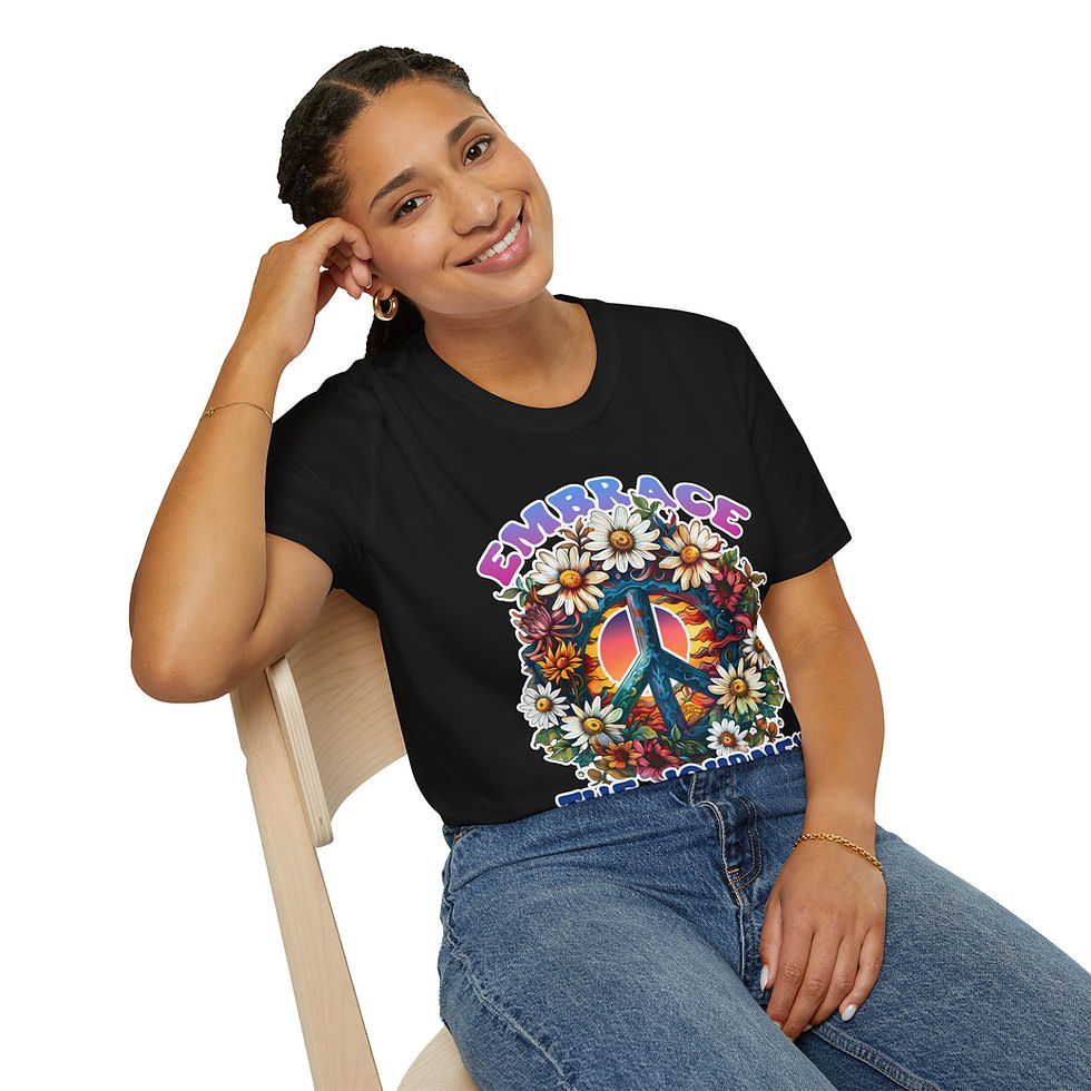 Thumbnail: Woman wearing black t-shirt with Peace Love Groovy design, sitting on chair.