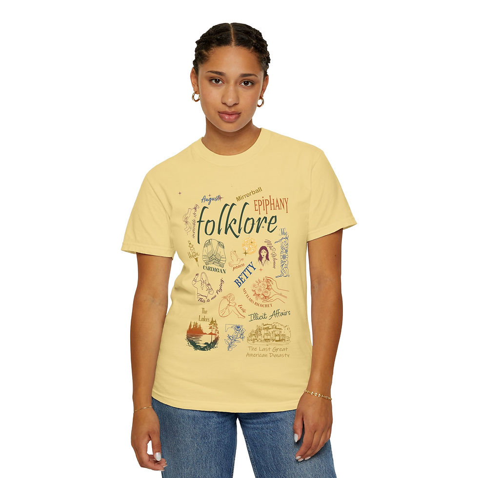 Thumbnail: Woman wearing yellow Folklore t-shirt with different illustrations and text design.
