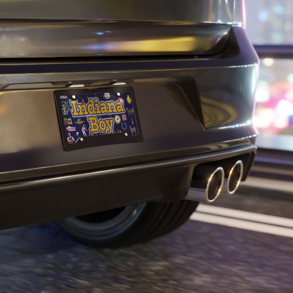 Thumbnail: Indiana Boy license plate on a car's bumper, with dual exhaust pipes.
